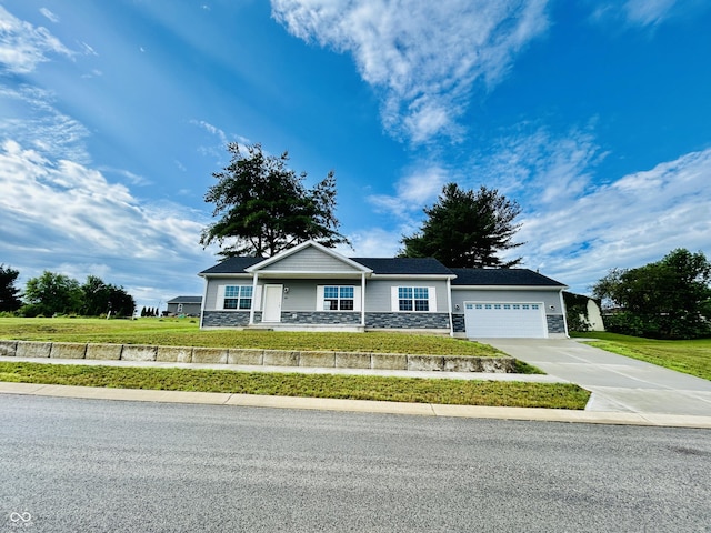 10 Doe Creek Cir, Cloverdale, IN 46120 - view of front facade featuring stone siding, a garage, concrete driveway, and a front lawn