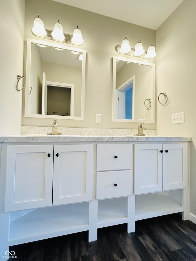 10 Doe Creek Cir, Cloverdale, IN 46120 - bathroom featuring wood finished floors and double vanity