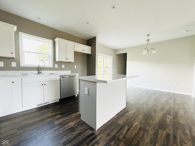 10 Doe Creek Cir, Cloverdale, IN 46120 - kitchen with dishwasher, dark wood-style flooring, white cabinetry, and light countertops