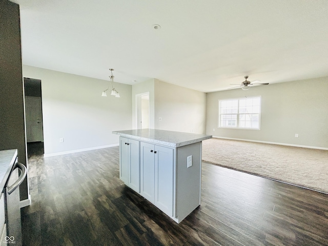 10 Doe Creek Cir, Cloverdale, IN 46120 - kitchen featuring open floor plan, dark wood-style flooring, and a ceiling fan