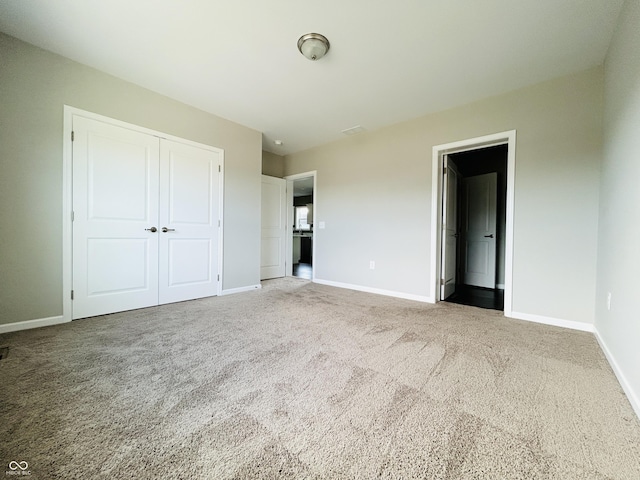 10 Doe Creek Cir, Cloverdale, IN 46120 - unfurnished bedroom featuring carpet flooring and a closet