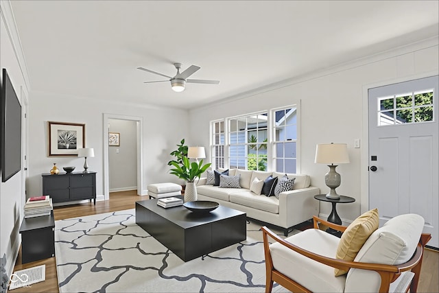 6711 Lafayette Rd, Indianapolis, IN 46278 - living area with a ceiling fan and wood finished floors