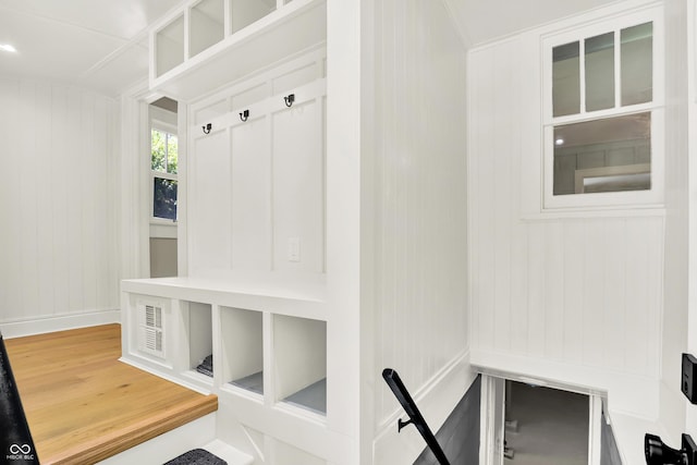 6711 Lafayette Rd, Indianapolis, IN 46278 - mudroom with wood finished floors and a decorative wall