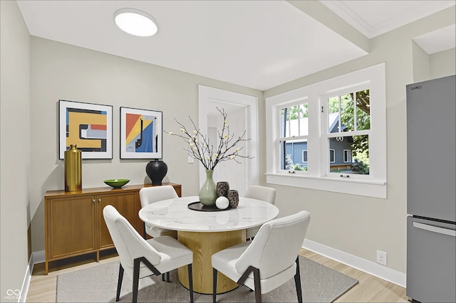 6711 Lafayette Rd, Indianapolis, IN 46278 - dining room with light wood-type flooring and baseboards