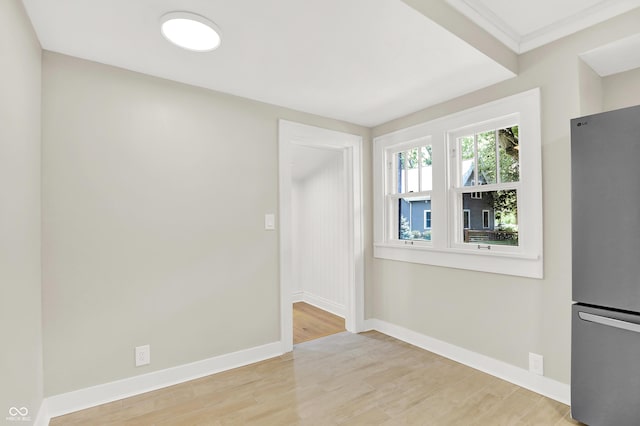 6711 Lafayette Rd, Indianapolis, IN 46278 - unfurnished dining area featuring light wood finished floors and baseboards