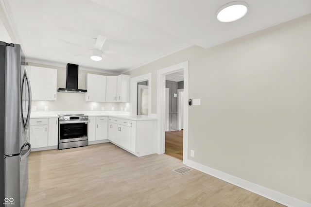 6711 Lafayette Rd, Indianapolis, IN 46278 - kitchen featuring appliances with stainless steel finishes, wall chimney range hood, a ceiling fan, light wood-type flooring, and crown molding