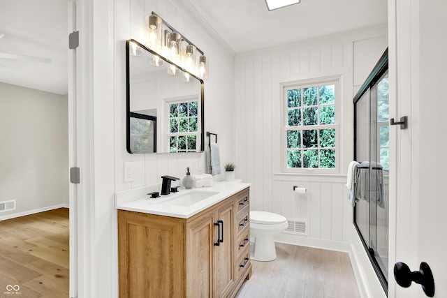 6711 Lafayette Rd, Indianapolis, IN 46278 - full bathroom featuring vanity, wood finished floors, and an enclosed shower