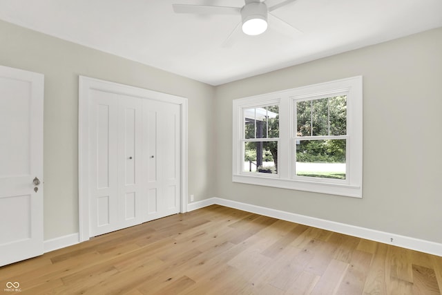 6711 Lafayette Rd, Indianapolis, IN 46278 - unfurnished bedroom featuring light wood finished floors, a closet, and ceiling fan