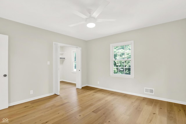 6711 Lafayette Rd, Indianapolis, IN 46278 - unfurnished room with light wood-style floors and ceiling fan
