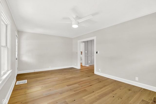 6711 Lafayette Rd, Indianapolis, IN 46278 - unfurnished room with ceiling fan, light wood-type flooring, and ornamental molding