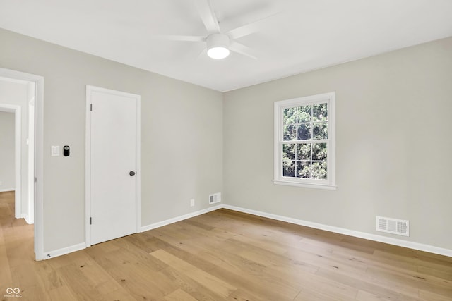 6711 Lafayette Rd, Indianapolis, IN 46278 - unfurnished bedroom with light wood-style flooring and ceiling fan