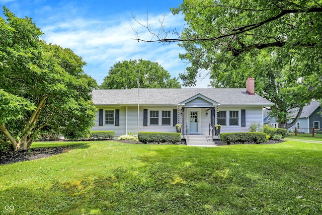 6711 Lafayette Rd, Indianapolis, IN 46278 - single story home with a chimney, a front lawn, and a shingled roof