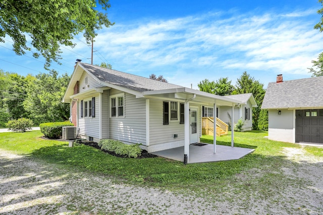 6711 Lafayette Rd, Indianapolis, IN 46278 - view of side of home featuring a yard and a patio