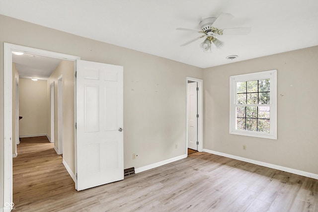 3302 Beech Dr, Columbus, IN 47203 - empty room featuring light wood finished floors and ceiling fan