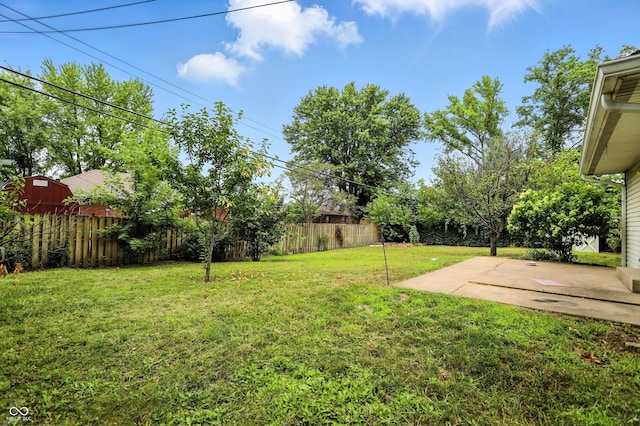 3302 Beech Dr, Columbus, IN 47203 - fenced backyard with a patio