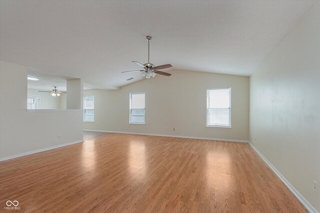 3183 Hemlock St, Whiteland, IN 46184 - spare room with ceiling fan, light wood-style flooring, plenty of natural light, and lofted ceiling