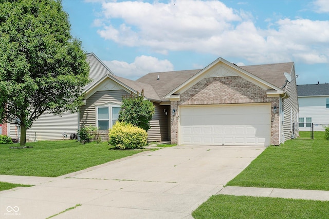 3183 Hemlock St, Whiteland, IN 46184 - ranch-style home with an attached garage, a front yard, and concrete driveway