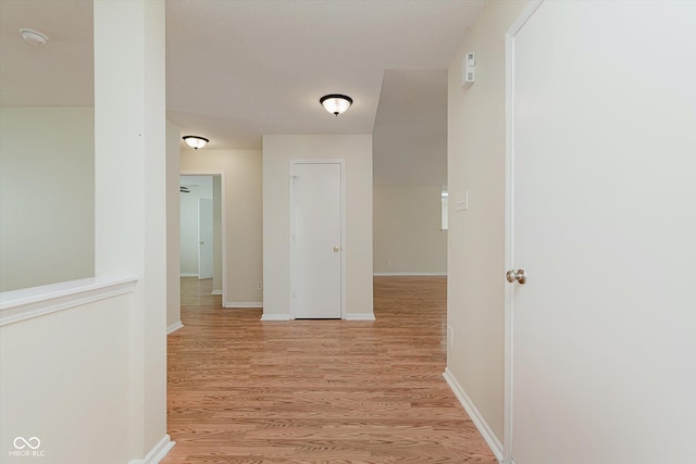 3183 Hemlock St, Whiteland, IN 46184 - hallway featuring light wood finished floors and baseboards
