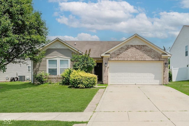3183 Hemlock St, Whiteland, IN 46184 - ranch-style home with an attached garage, driveway, and brick siding