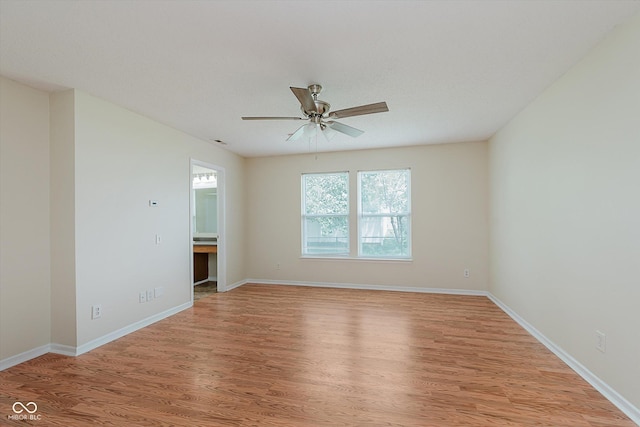 3183 Hemlock St, Whiteland, IN 46184 - spare room with light wood-style floors and a ceiling fan