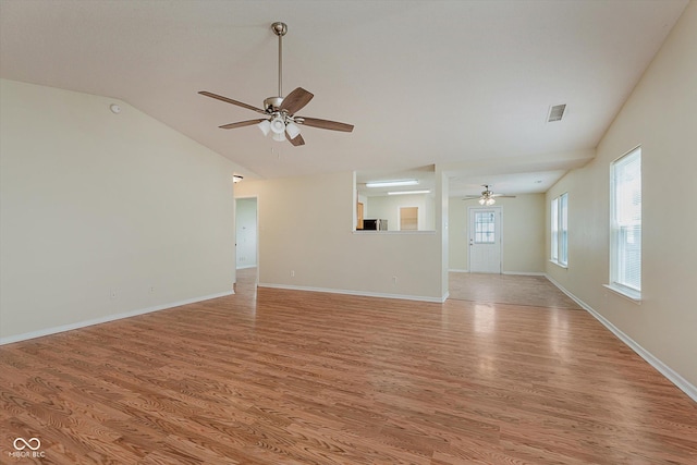 3183 Hemlock St, Whiteland, IN 46184 - unfurnished living room with ceiling fan, light wood-style flooring, and vaulted ceiling