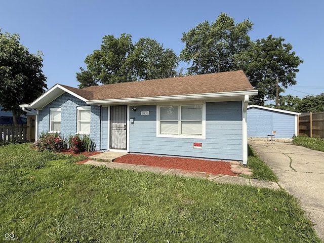 3834 N Mitthoefer Rd, Indianapolis, IN 46235 - ranch-style house featuring a detached garage and an outbuilding