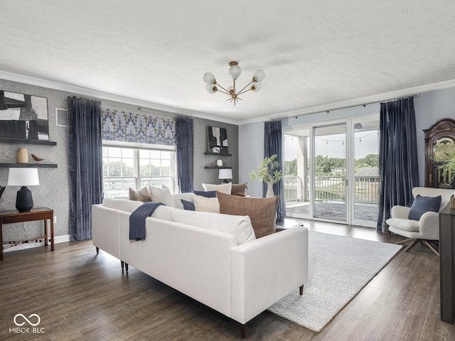 6730 Spirit Lake Dr Unit 202, Indianapolis, IN 46220 - living room with healthy amount of natural light, a textured ceiling, crown molding, a chandelier, and dark wood finished floors