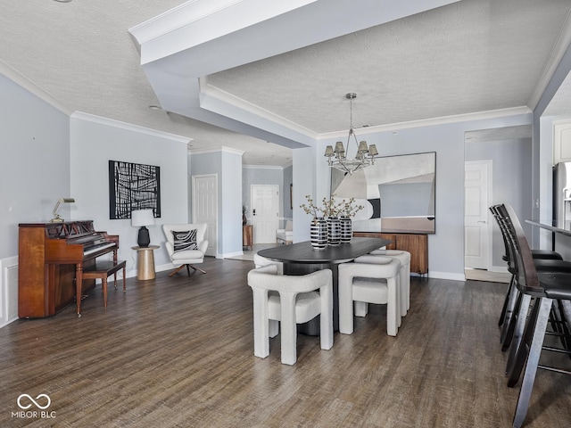 6730 Spirit Lake Dr Unit 202, Indianapolis, IN 46220 - dining room featuring a chandelier, a textured ceiling, dark wood finished floors, and crown molding
