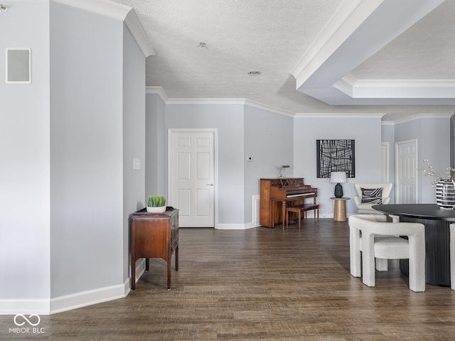6730 Spirit Lake Dr Unit 202, Indianapolis, IN 46220 - dining space with dark wood finished floors, ornamental molding, and a textured ceiling