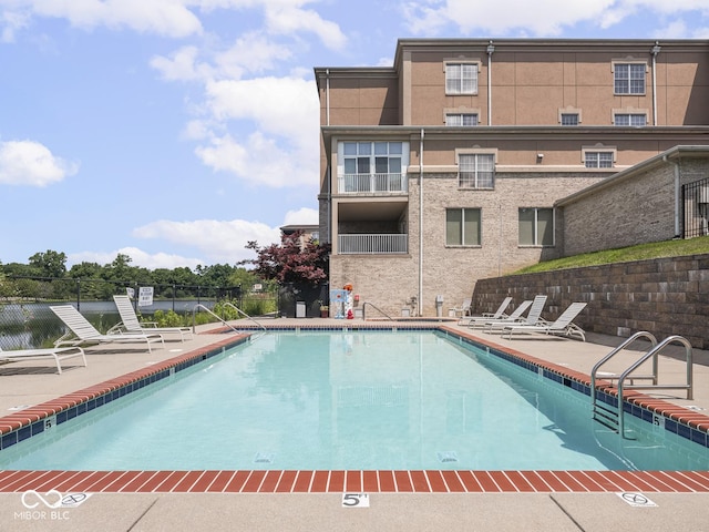 6730 Spirit Lake Dr Unit 202, Indianapolis, IN 46220 - community pool featuring a patio