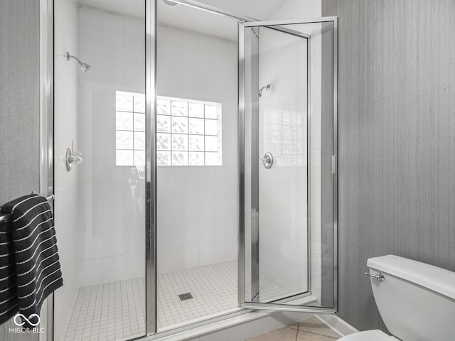 6730 Spirit Lake Dr Unit 202, Indianapolis, IN 46220 - full bathroom with a stall shower and tile patterned floors