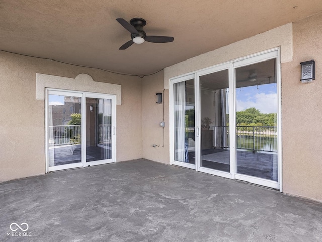 6730 Spirit Lake Dr Unit 202, Indianapolis, IN 46220 - view of patio featuring a ceiling fan and a water view
