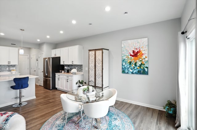 18750 Terra Vis Pl, Westfield, IN 46074 - dining area featuring dark wood-type flooring and recessed lighting
