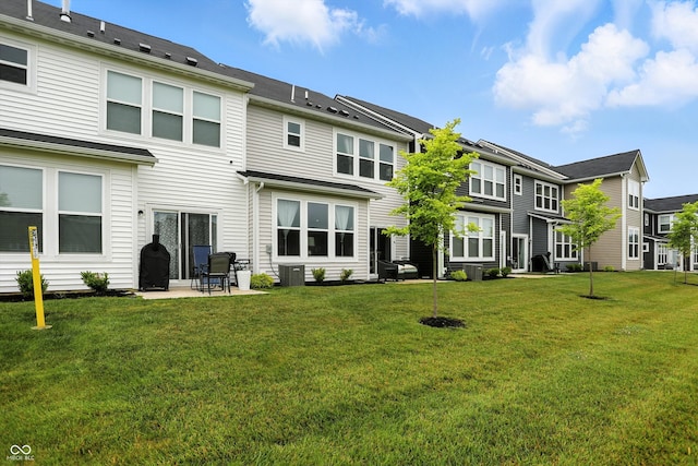 18750 Terra Vis Pl, Westfield, IN 46074 - back of house featuring a patio and a lawn