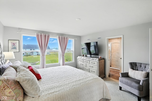 18750 Terra Vis Pl, Westfield, IN 46074 - bedroom featuring light carpet and connected bathroom