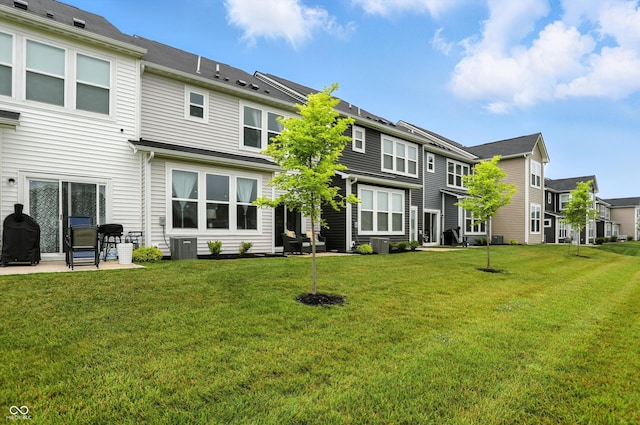 18750 Terra Vis Pl, Westfield, IN 46074 - back of house with a residential view, a yard, and a patio