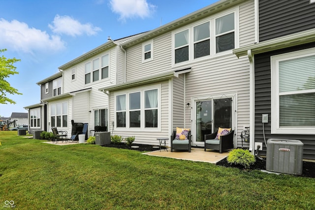 18750 Terra Vis Pl, Westfield, IN 46074 - rear view of house with a patio and a yard