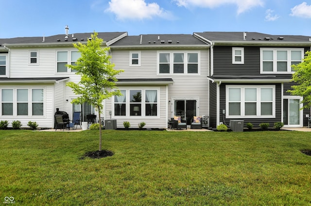 18750 Terra Vis Pl, Westfield, IN 46074 - rear view of house with a lawn, outdoor lounge area, and a patio