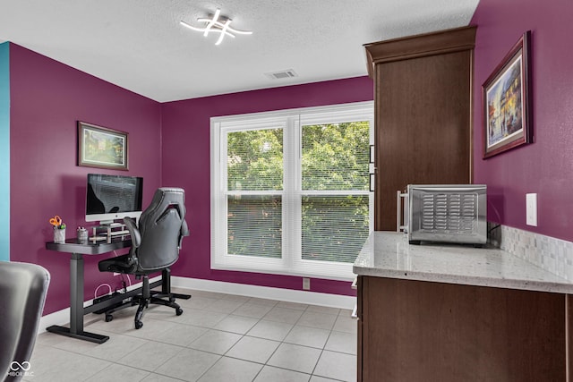 8650 Jaffa Ct W Drive 32, Indianapolis, IN 46260 - home office featuring a textured ceiling and baseboards