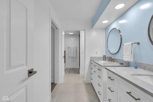 8650 Jaffa Ct W Drive 32, Indianapolis, IN 46260 - bathroom with vanity, tile patterned floors, and recessed lighting