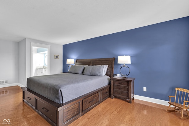 8650 Jaffa Ct W Drive 32, Indianapolis, IN 46260 - bedroom with light wood-style floors