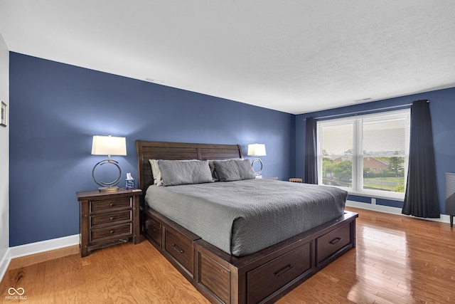 8650 Jaffa Ct W Drive 32, Indianapolis, IN 46260 - bedroom with light wood-type flooring