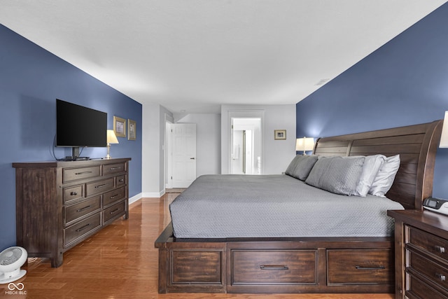 8650 Jaffa Ct W Drive 32, Indianapolis, IN 46260 - bedroom featuring wood finished floors and baseboards