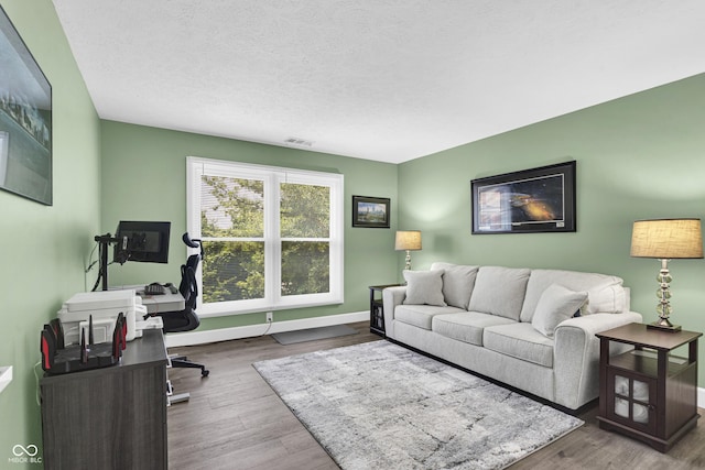 8650 Jaffa Ct W Drive 32, Indianapolis, IN 46260 - home office featuring wood finished floors and a textured ceiling