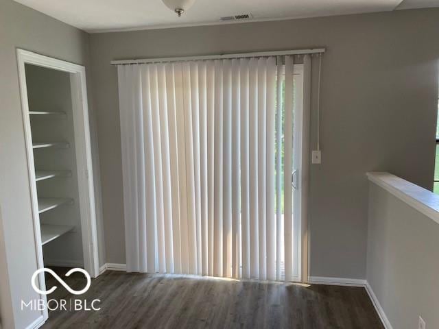 7313 Shanna Cir, Indianapolis, IN 46236 - unfurnished dining area featuring wood finished floors and healthy amount of natural light