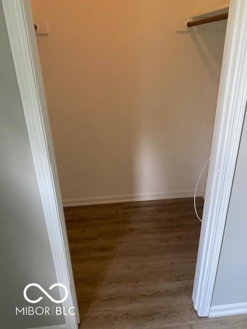 7313 Shanna Cir, Indianapolis, IN 46236 - walk in closet featuring wood finished floors