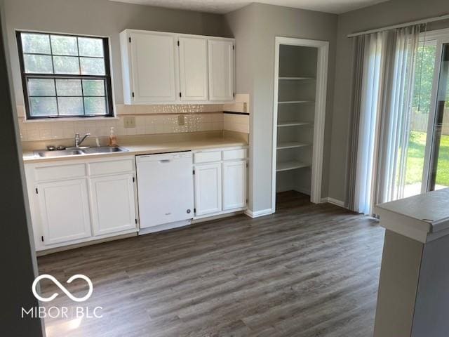 7313 Shanna Cir, Indianapolis, IN 46236 - kitchen with dishwasher, white cabinets, plenty of natural light, and light countertops
