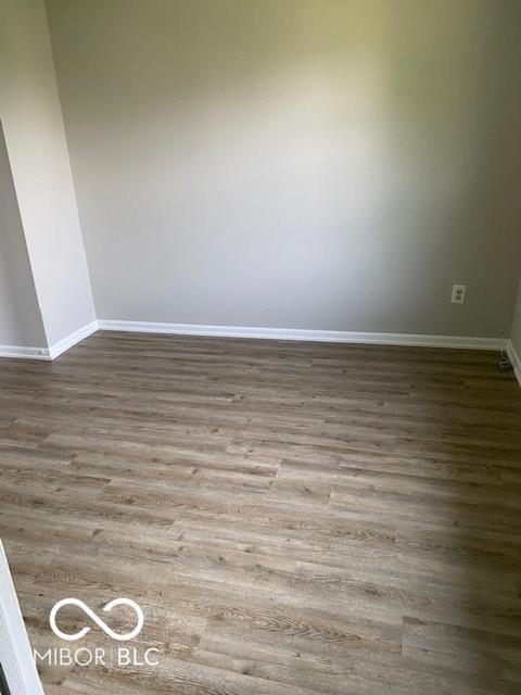 7313 Shanna Cir, Indianapolis, IN 46236 - spare room with baseboards and wood finished floors
