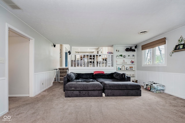 1616 Beech Cir, Plainfield, IN 46168 - carpeted living room with a wainscoted wall