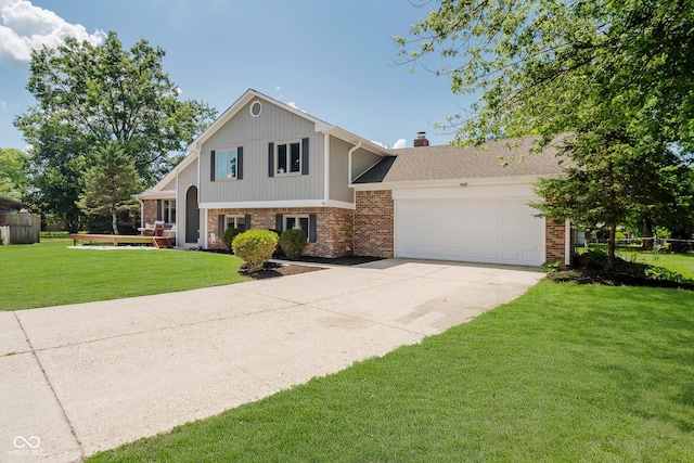 1616 Beech Cir, Plainfield, IN 46168 - split level home with brick siding, an attached garage, concrete driveway, a front yard, and a chimney
